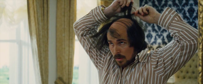 IMAGE: Still - Irving does his hair
